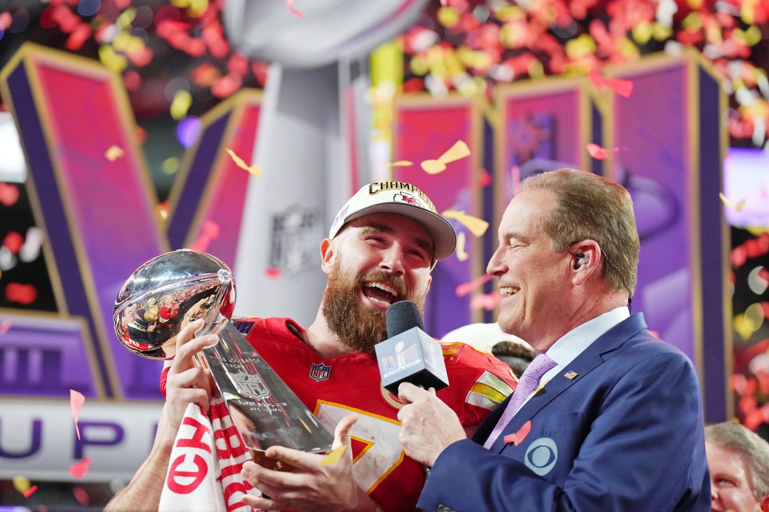 Feb 11, 2024; Paradise, Nevada, USA; Kansas City Chiefs tight end Travis Kelce (87) celebrates while being interviewed by CBS commentator Jim Nantz after winning Super Bowl LVIII against the San Francisco 49ers at Allegiant Stadium. Mandatory Credit: Kirby Lee-USA TODAY Sports  